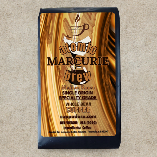 Coffee bag with 'atomic Marcurie brew' branding on a textured beige background